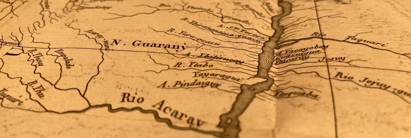 A close-up view of a map, showing the intricate detail of the illustration