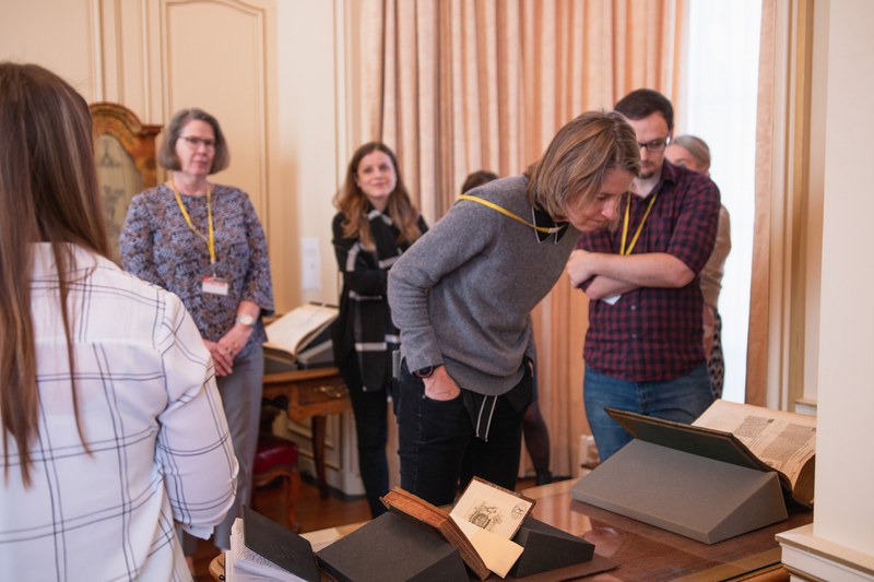 Folger Institute Executive Director Kathleen Lynch and members of the Before “Farm to Table” team, including postdoctoral research fellow Elisa Tersigni, codirector Heather Wolfe, and postdoctoral research fellow Michael Walkden, gather in the Rare Book Reading Room