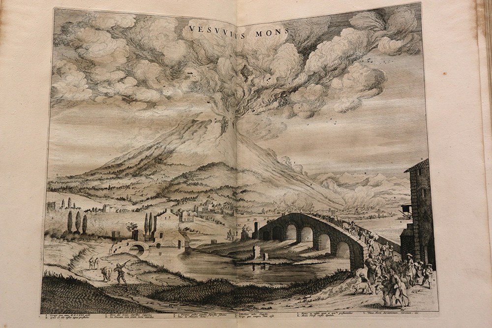The workshop somewhat fancifully depicted the eruption of Mount Vesuvius, with peasants fleeing in the foreground. 