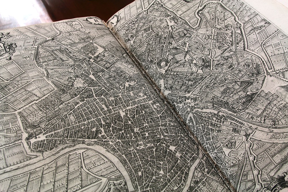 The volume on the Papal States features this highly detailed depiction of seventeenth-century Rome. 