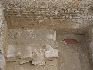 Fig. 3: Tombs along the north wall of the Small Vaulted Room.