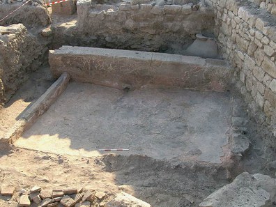 Fig. 4: View of the Byzantine Dark Age treading floor and collection vats in Trench XE.