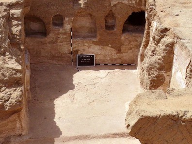 Fig. 4: Room 4a at floor level with five niches along south wall and a window above the central niche.