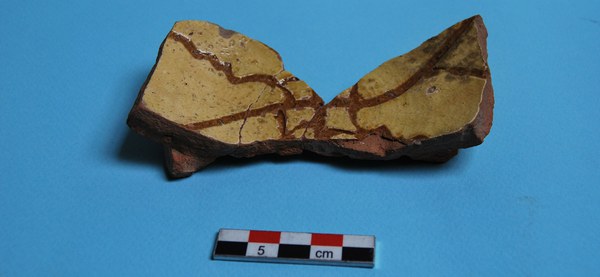 Base and body fragment of an incised sgraffito-ware bowl, last quarter of the 12th–beginning of the 13th century