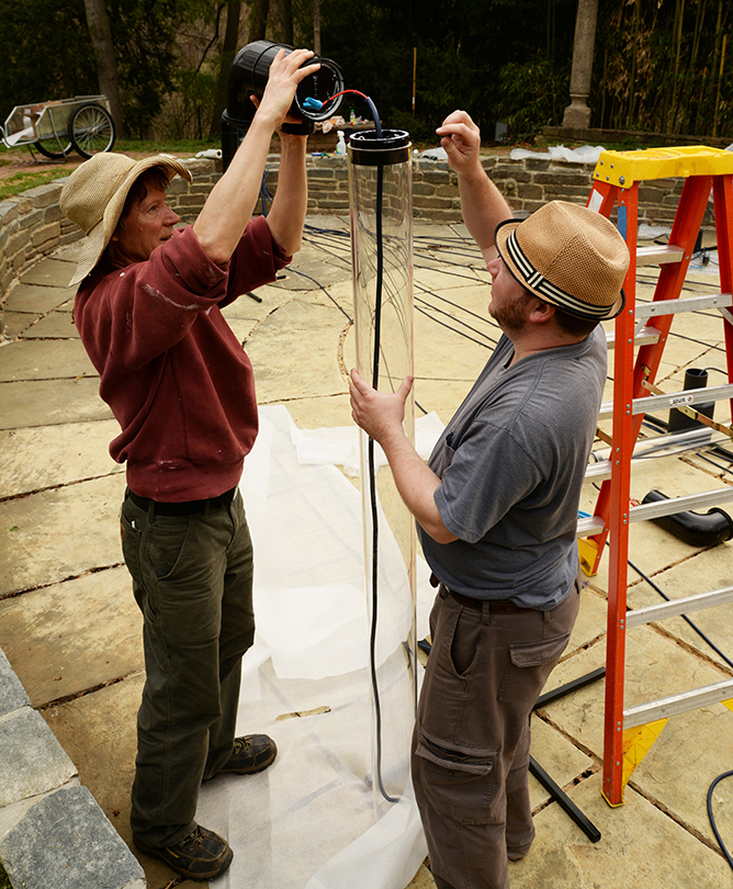 Livingston and Howell installing speakers for "The Pool of 'Bamboo Counterpoint'"