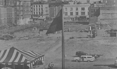 A red, black, and green flag flies over “Reclamation Site #1” in Harlem, New York, in the summer of 1969. Source: Harlem News, October 1969. Photo by Doug Harris, courtesy of Arthur L. Symes.
