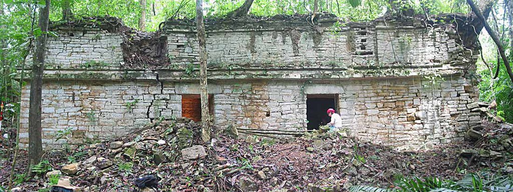 Fig. 3: Front of Structure D3-1, approximately 16.25 meters in length. Note the looter's piles in front of the doorways to Rooms 1 and 2 (Photo A. Heginbotham, digitally sewn from 3 photos with Canon PhotoStitch software).