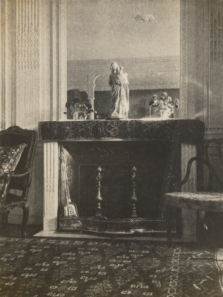 The salon of the Blisses' apartment in Paris, with a statue of the Virgin on the mantle