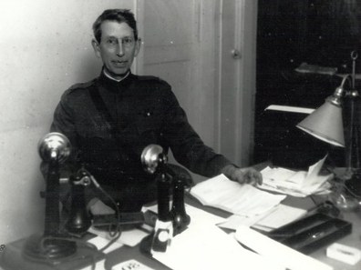 Colonel Ralph Van Deman seated behind a desk