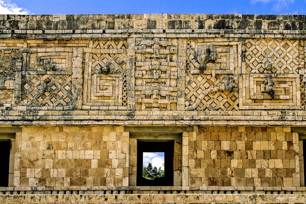 Uxmal, Entwined Serpents on Façade at the North End of the West Building, Nunnery Quadrangle. Photo: Jay A. Frogel.