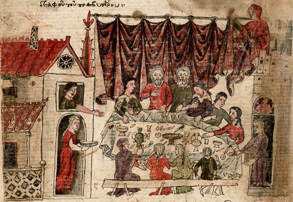 Detail of manuscript depicting the children of Job feasting