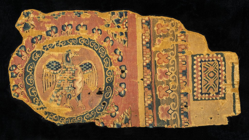 Fragment with eagle and jeweled border