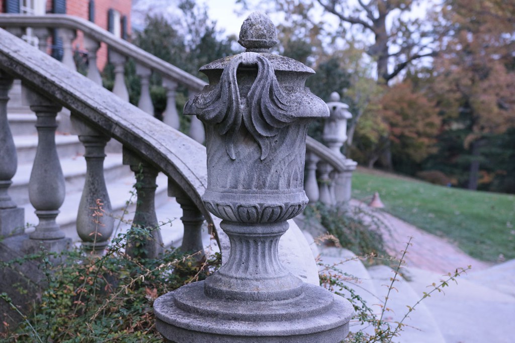 Stone vase atop the balustrade for the steps heading to the front door of the Main House at Dumbarton Oaks