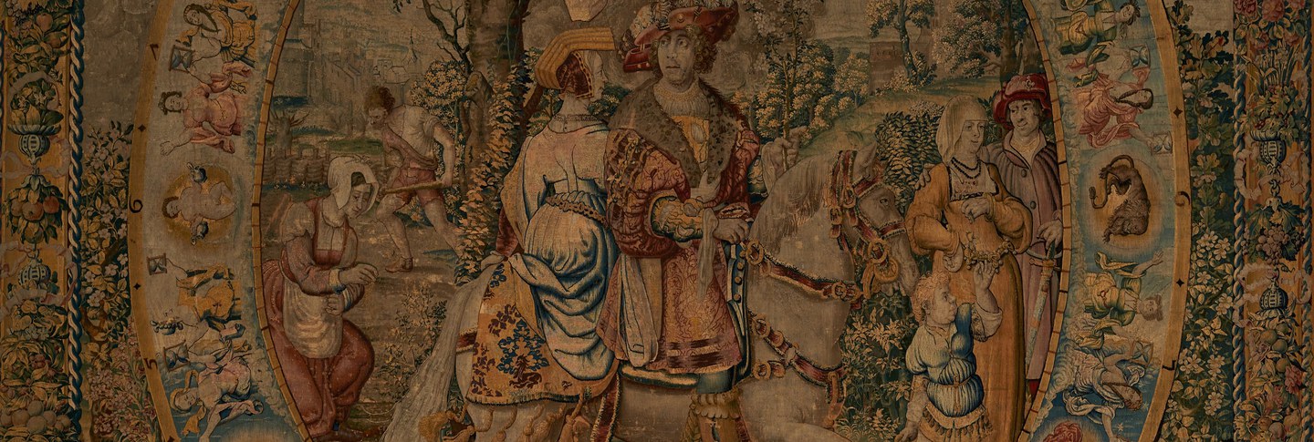 Tapestry depicting the goddess of flowers overseeing an aristocratic couple riding through the countryside where peasants sow grain and till the fields and a couple and child stroll.